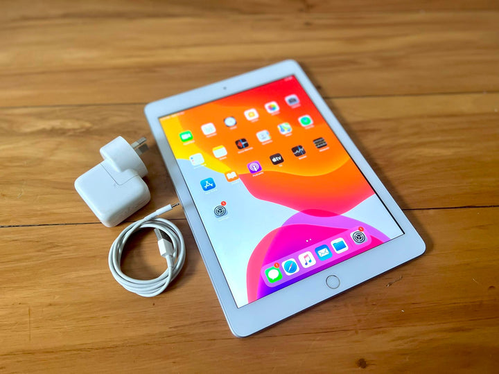 Apple iPad 6th Gen 128GB Wi-Fi Cellular 3G/4G White Silver - New Battery (As New)
